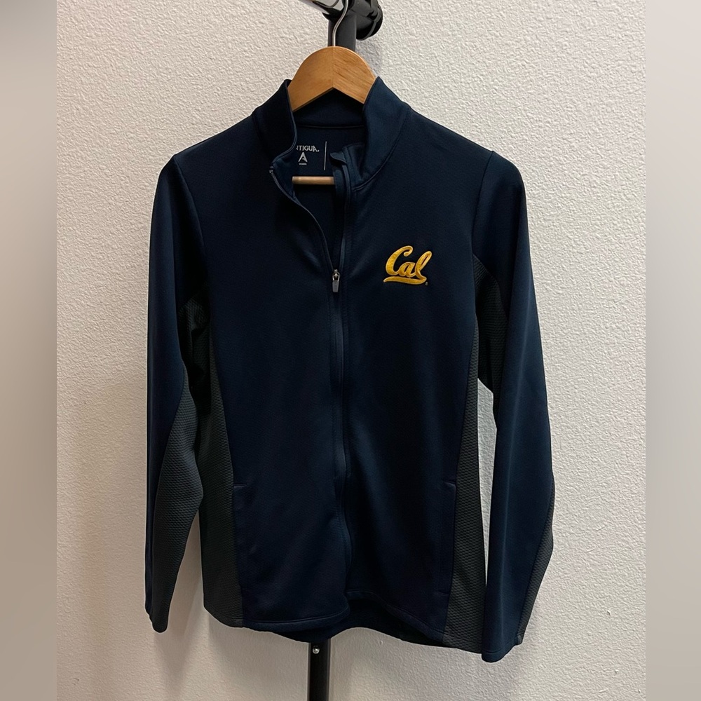 Cal zip up jacket, navy blue with pockets. Size large, Antigua women’s.